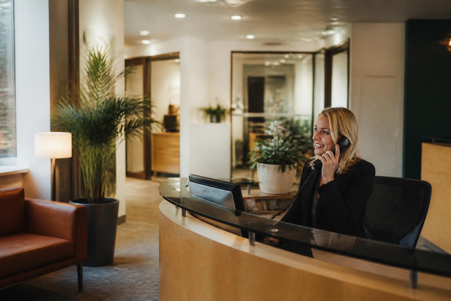 Bright modern office reception with warm ambient light